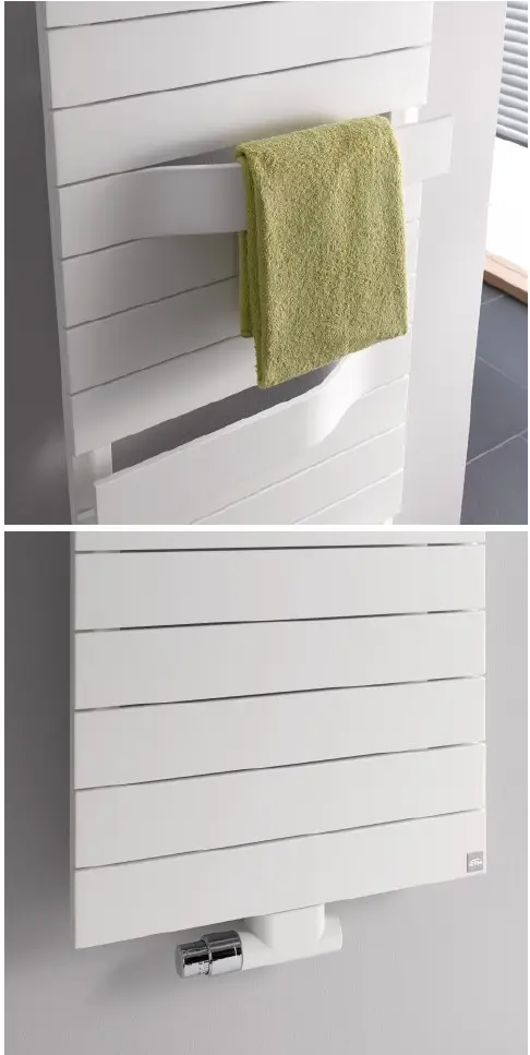 Kermi-Heizkörper in Weiß mit horizontalen Lamellen, geeignet für Handtücher, montiert an einer Wand in einem modernen Raum. Ventil an der unteren Seite sichtbar.